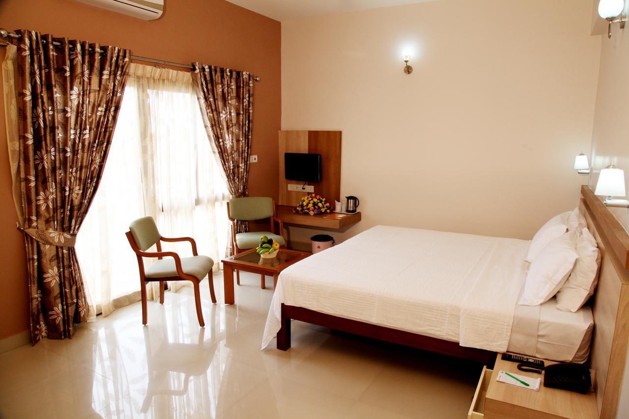 Hotel Polariz Parassinikkadavu Oda fotoğraf